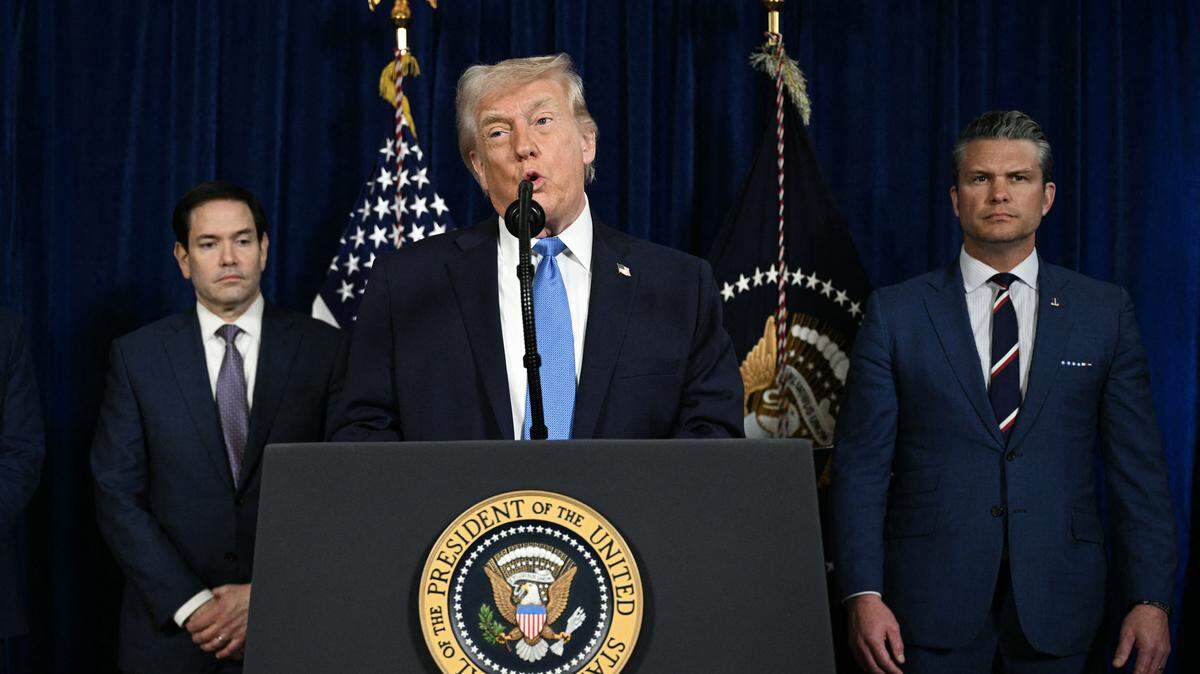 President Donald Trump, alongside Secretary of State Marco Rubio (L) and US Secretary of Defense Pete Hegseth (R), speaks to the press following US military actions in Venezuela, at his Mar-a-Lago residence in Palm Beach on Jan. 3, 2025. 