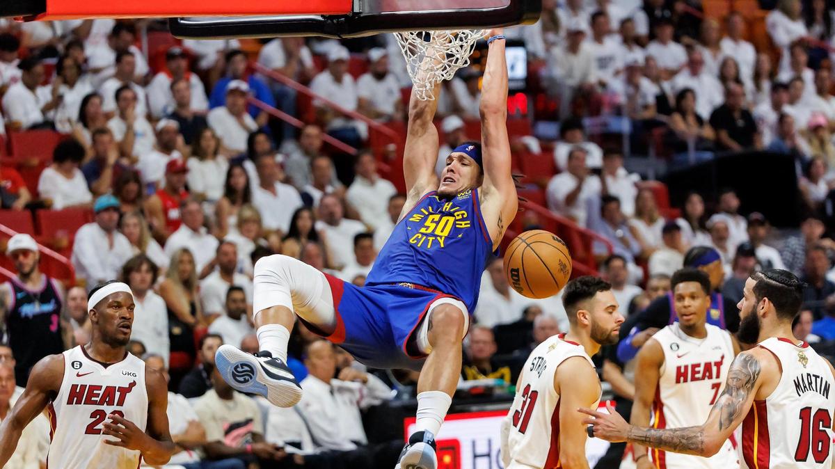 Denver Nuggets forward Aaron Gordon (50) dunks during the first half of Game 3 of the NBA Finals against the Miami Heat at the Kaseya Center on Wednesday, June 7, 2023, in Miami, Florida.