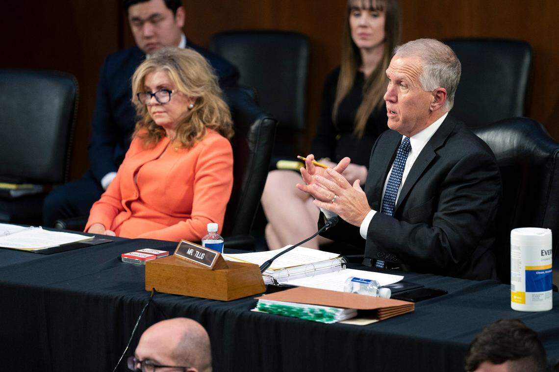 Sen. Marsha Blackburn, R-Tenn., left, listens as Sen. Thom Tillis, R-N.C., gives his opening remarks during the confirmation hearing of Supreme Court nominee Ketanji Brown Jackson before the Senate Judiciary Committee on Monday, March 21, 2022, in Washington.