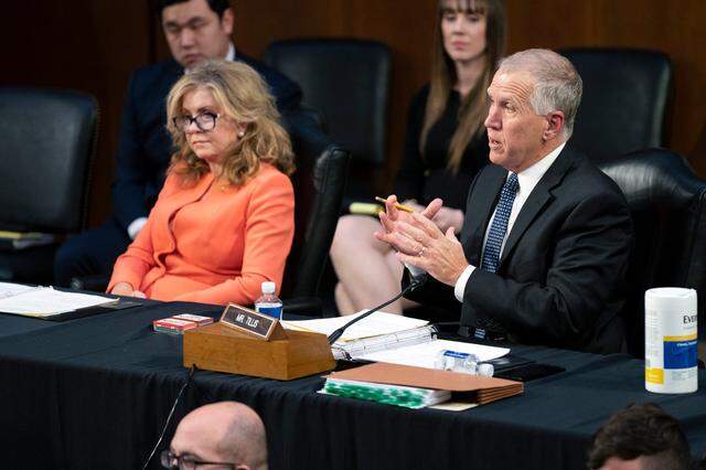 Sen. Marsha Blackburn, R-Tenn., left, listens as Sen. Thom Tillis, R-N.C., gives his opening remarks during the confirmation hearing of Supreme Court nominee Ketanji Brown Jackson before the Senate Judiciary Committee on Monday, March 21, 2022, in Washington.