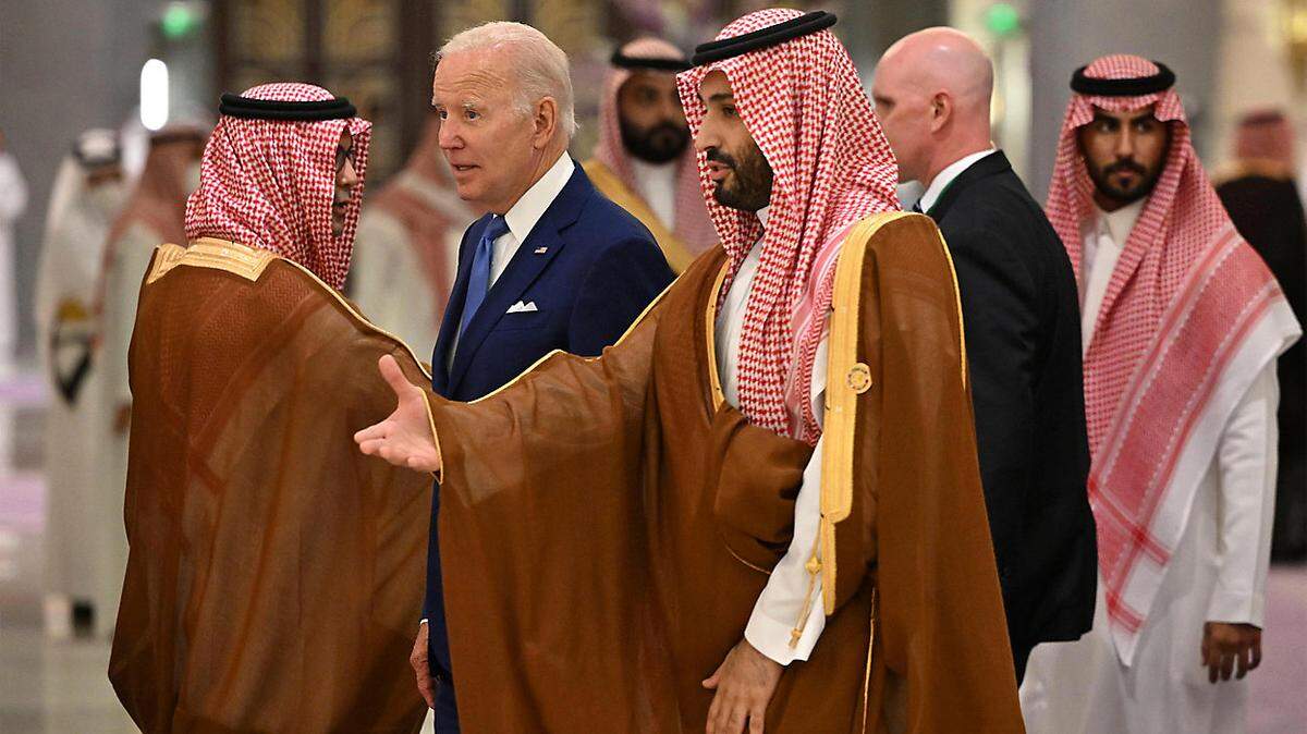 On July 16, President Joe Biden, center left, and Saudi Crown Prince Mohammed bin Salman, center, arrive at the Gulf Cooperation Council meeting in Jeddah, Saudi Arabia.