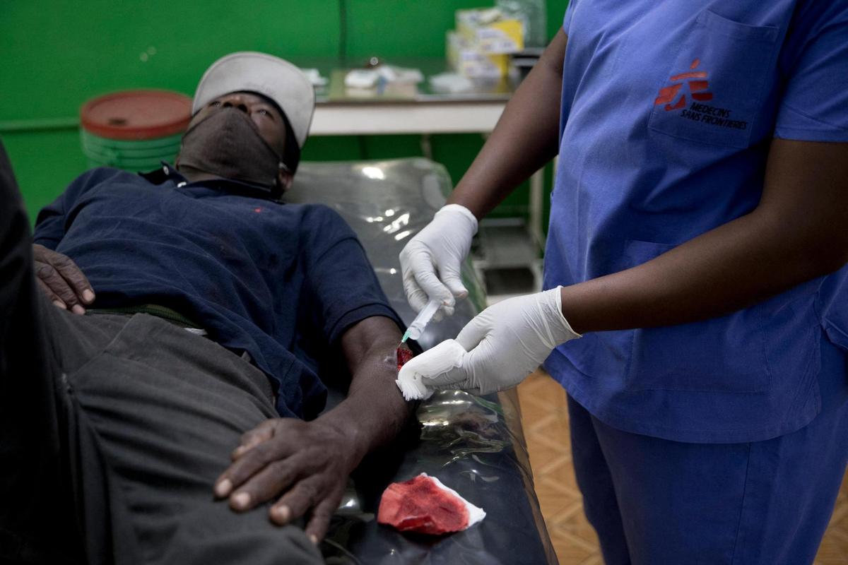 Médecins Sans Frontières/Doctors Without Borders is celebrating 30 years in Haiti, as a medical worker takes care of a patient at the Martissant hospital, in Martissant, Haiti on May 31, 2021. “It’s a tough area,” summarizes Frandy Samson, the head of medical operations for the emergency clinic in the gang-ridden neighborhood.