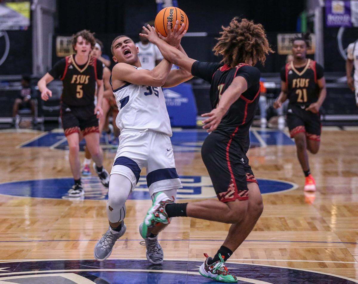 Riviera Prep’s Dante Allen (35), seen here in last season’s state boys’ basketball finals, continues to play a factor for the Bulldogs this season.