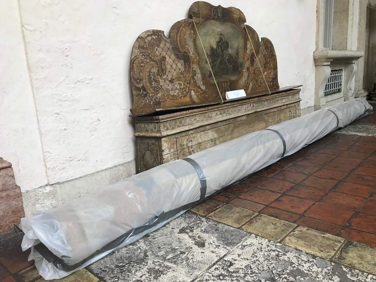 The Dining Room rug is rolled up and wrapped at Miami’s Vizcaya Museum and Gardens in preparation for Hurricane Dorian’s effects. The bayfront palace, filled with antiquities, is vulnerable to storm surge.