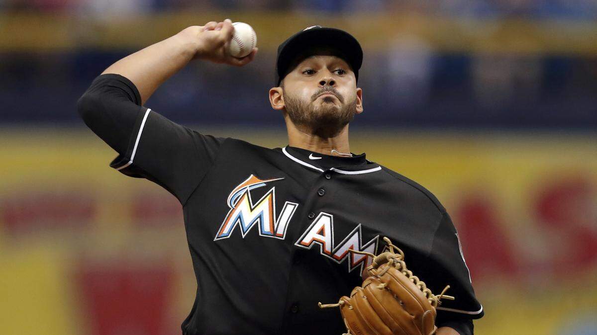 Miami Marlins starting pitcher Pablo Lopez throws during the first inning of a baseball game against the Tampa Bay Rays, Saturday, July 21, 2018, in St. Petersburg, Fla. (AP Photo/Mike Carlson)