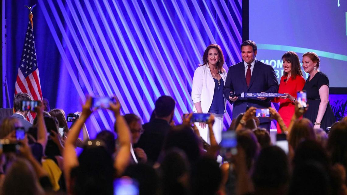 Gov. DeSantis is presented with “The Liberty Sword” during the Moms for Liberty National Summit on Friday, July 15, 2022 in Tampa.
