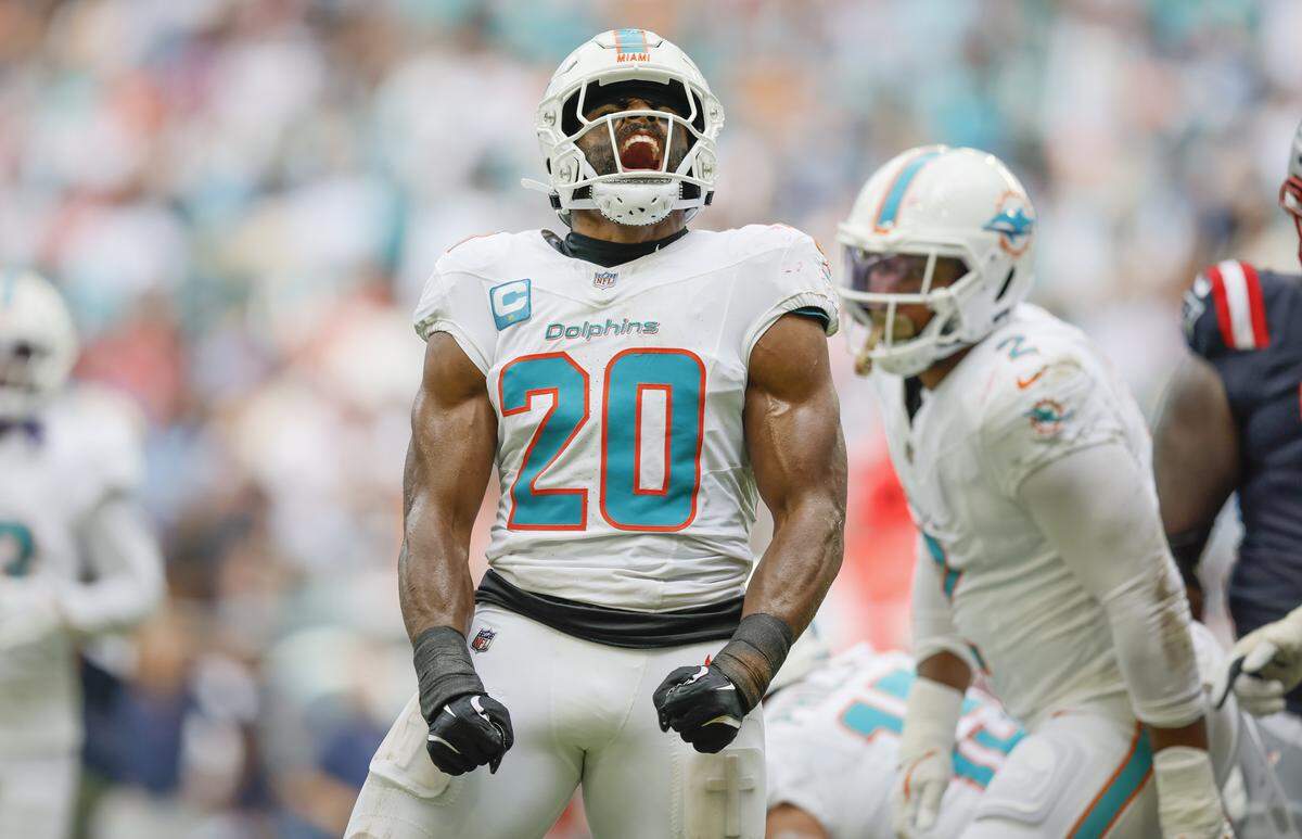 Miami Dolphins linebacker Jordyn Brooks (20) reacts after a stop in the NFL football game against the New England Patriots Hard Rock Stadium in Miami Gardens, Florida, on Sunday, September 14, 2025.