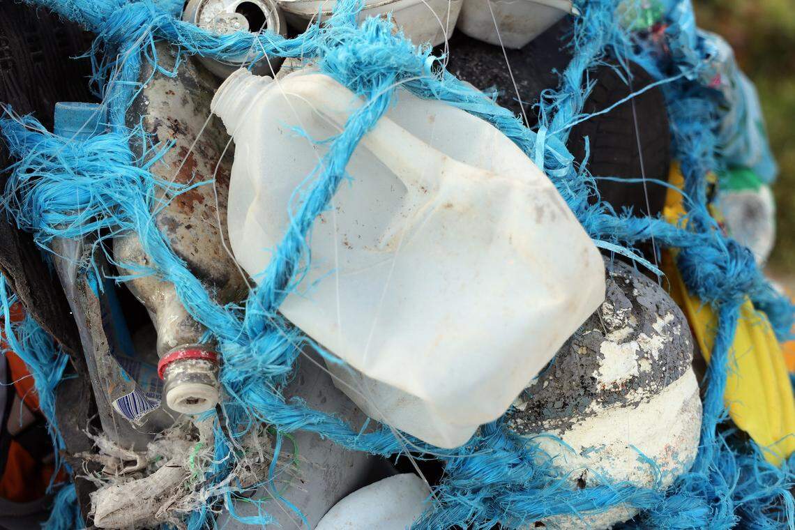 Plastic bottles, cans, tires, glass, and rope are some of the items that Andrew Otazo will carry on his back during the Miami Marathon to bring attention to his effort to clean up the coastline.