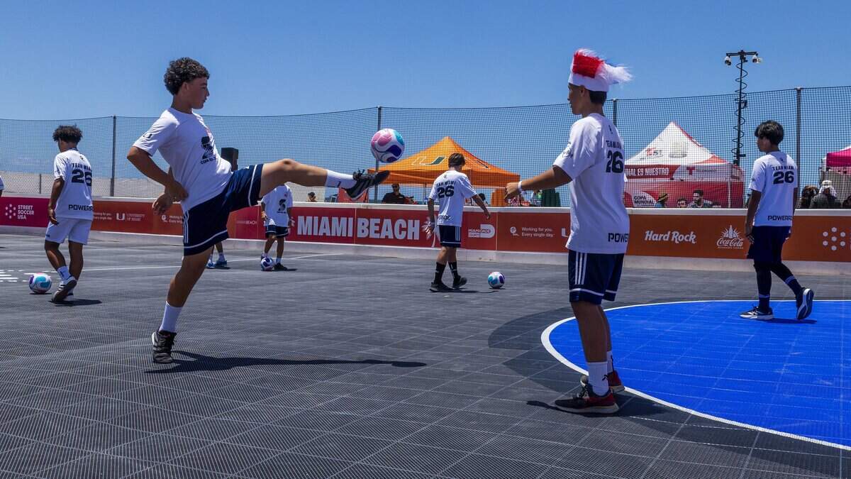 Emmanuel Quintero (left) and Julian Alvarez practice after the Guinness World Records freestyle activation where soccer fans around the world juggled a ball in unison for 10 seconds in an official Guinness World Records attempt ahead of the FIFA's World Cup 2026, at Lummus Park in Miami Beach.