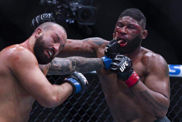 Curtis Blaydes of the United States and Josh Hokit of the United States fight in their heavyweight bout at UFC 327 at the Kaseya Center on Saturday, April 11, 2026, in downtown Miami, Fla.