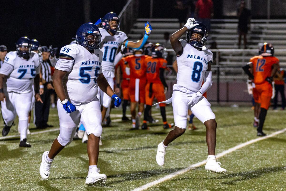 Palmetto Senior High players react to defeating the Homestead Broncos 13-12 after a high school football game at Harris Field in Homestead, Florida, on Friday, August 25, 2023.