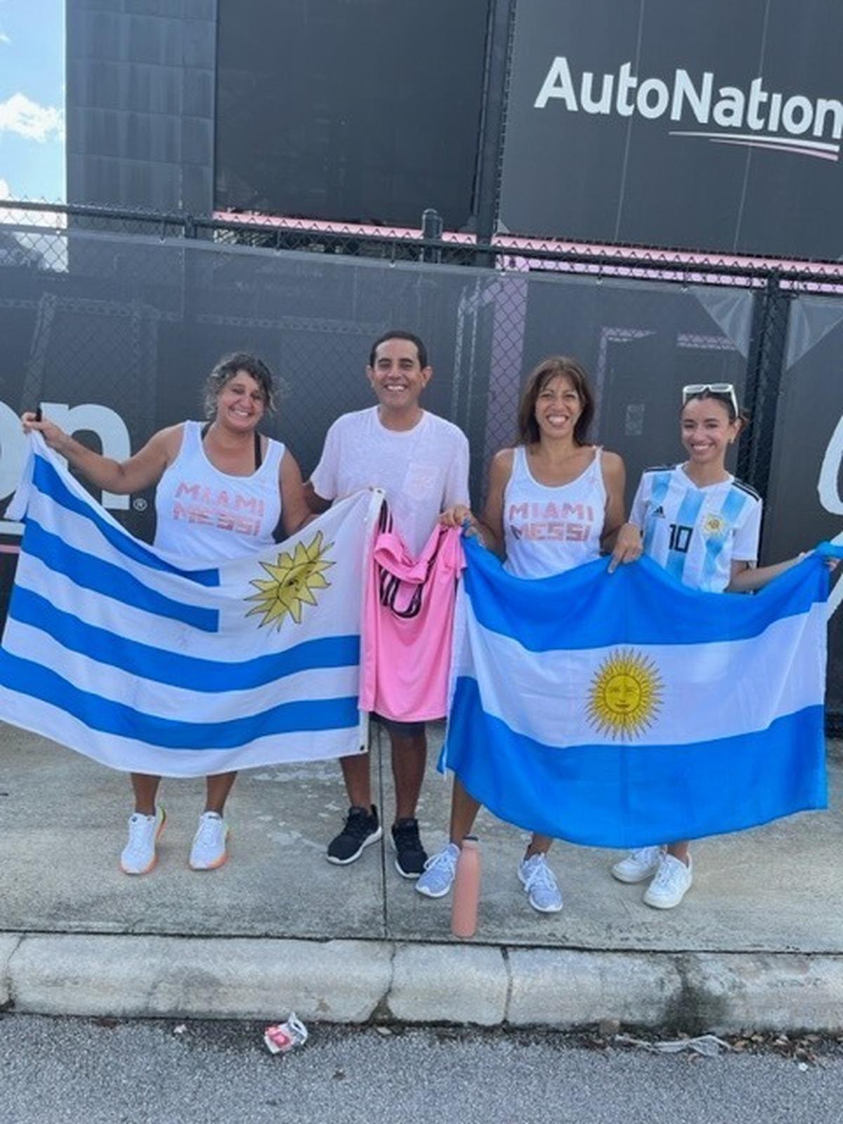 Messi fan Monica Mendez of Hollywood, far left, and her friends waited in the parking lot across from the Inter Miami training facility in hopes of getting a glimpse of their hero