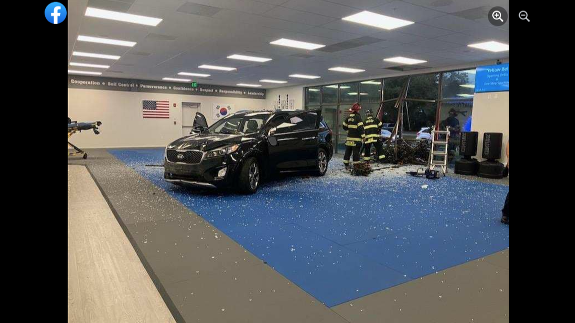 Police and firefighters found a black SUV in the middle of the studio, police said.