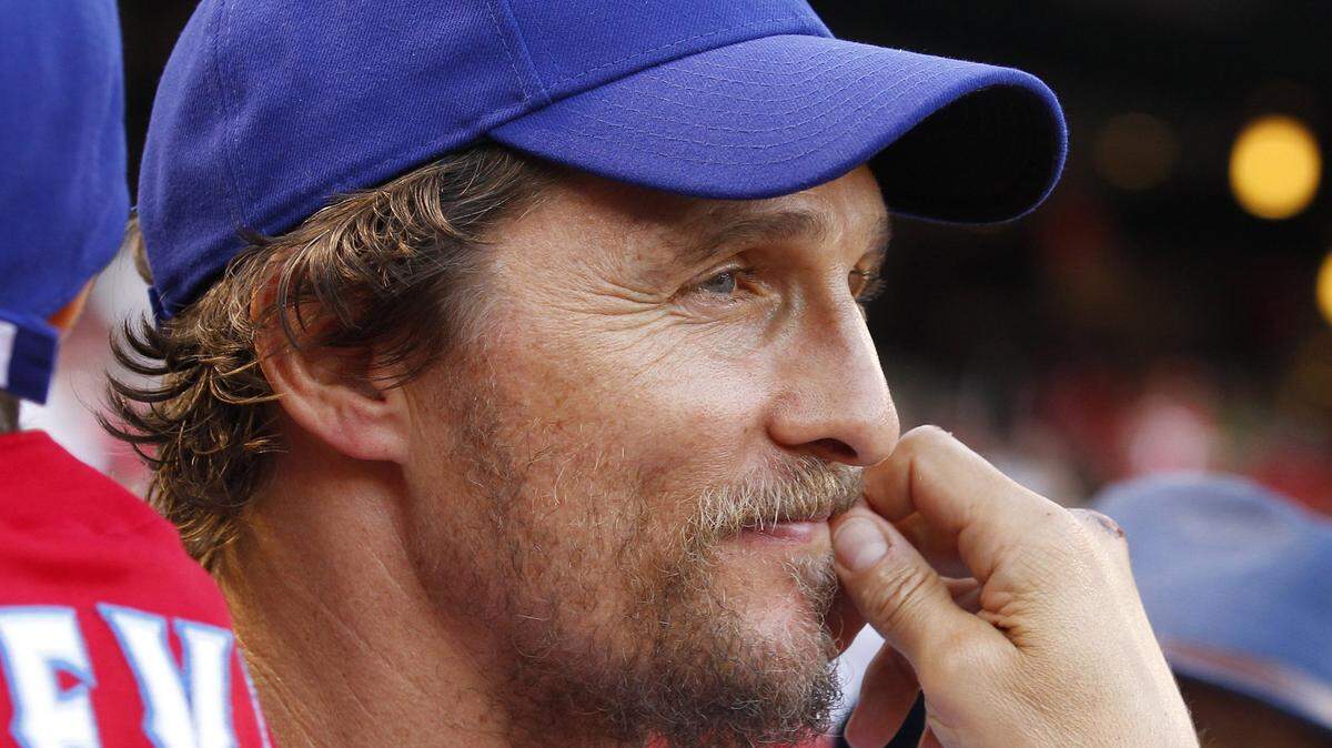 Actor Matthew McConaughey watches the Texas Rangers play host to the Toronto Blue Jays at Globe Life Park in Arlington, Texas, on Friday May 16, 2014. (Richard W Rodriguez/Fort Worth Star-Telegram/TNS)