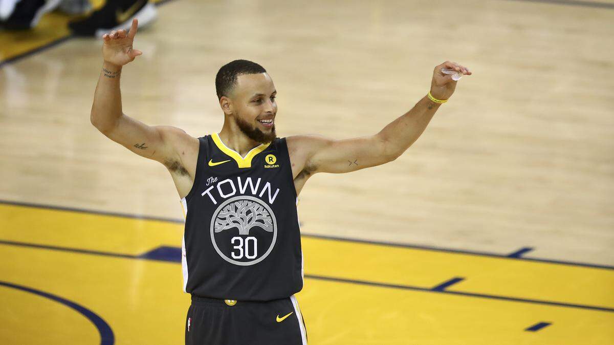 Golden State Warriors guard Stephen Curry (30) celebrated during the second half of Game 2 of basketball's NBA Finals in Oakland, Calif., on June 3, 2018. Curry and the Warriors could have ex-Cat DeMarcus Cousins next season if he recovers well from his Achilles injury.