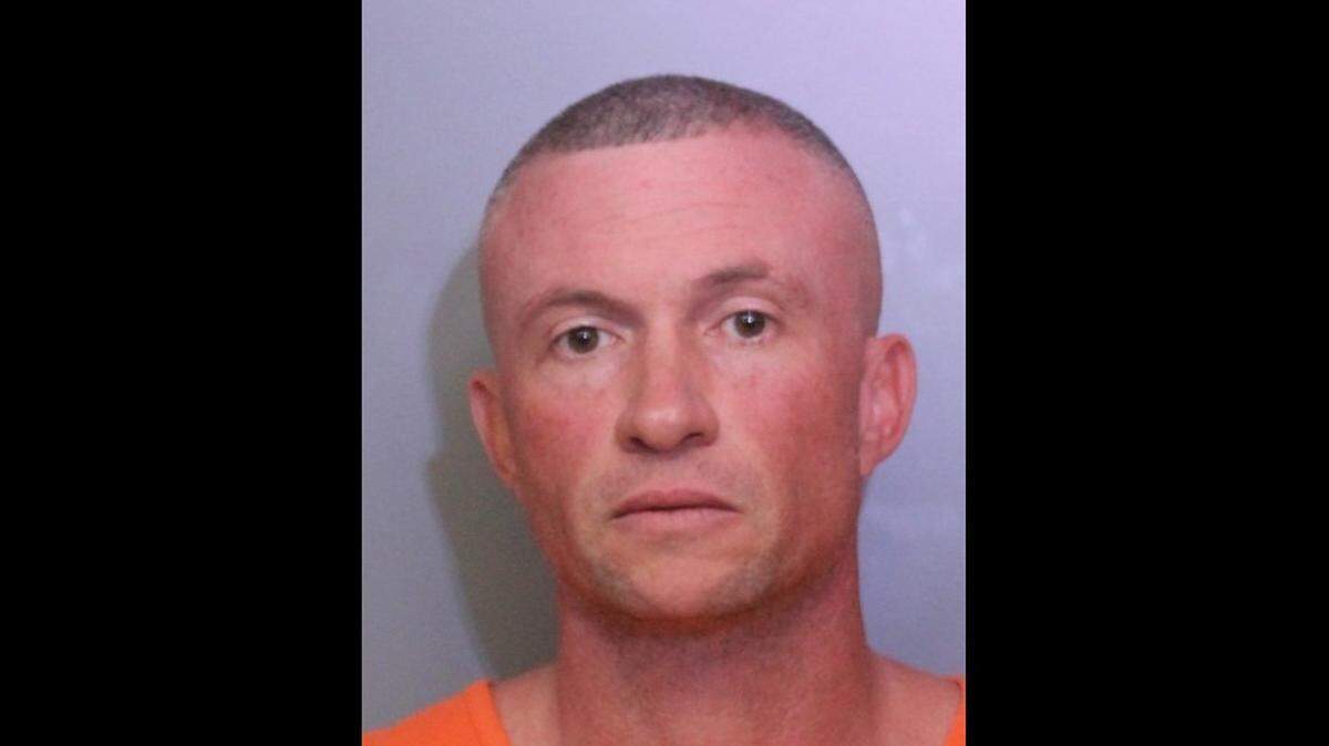 Scott Walker in his Polk County Sheriff’s Office photo
