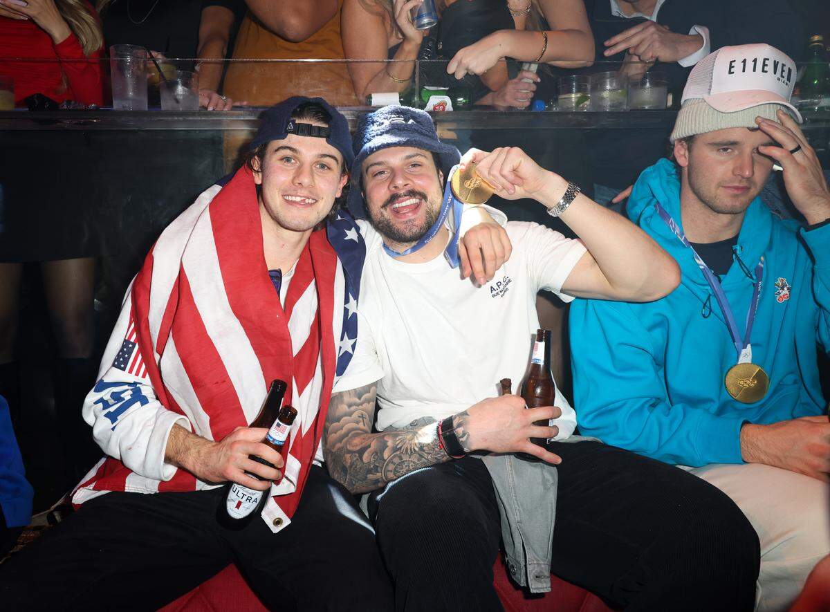 MIAMI, FLORIDA - FEBRUARY 23: Jack Hughes and Auston Matthews attend a celebration of the USA Men's Hockey Team's Olympic Gold at E11EVEN Miami on February 23, 2026 in Miami, Florida.  (Photo by Alexander Tamargo/Getty Images for E11EVEN Miami)