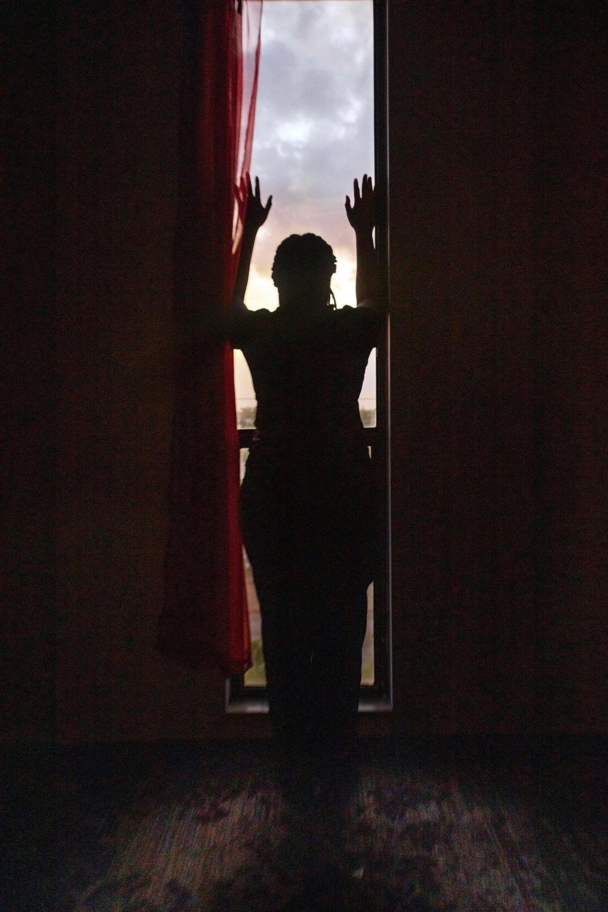 Michelle, a Haitian immigrant, silently wrestles with the loss of her Temporary Protected Status and the difficult decision of whether to stay or self-deport, on Friday, March 28, 2025, in Miami Gardens, Florida.