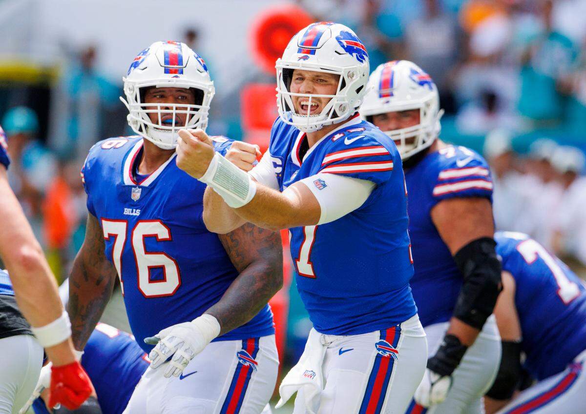 Buffalo Bills quarterback Josh Allen (17) calls a play during the first quarter of an NFL football game against the Miami Dolphins at Hard Rock Stadium on Sunday, September 25, 2022 in Miami Gardens, Florida.