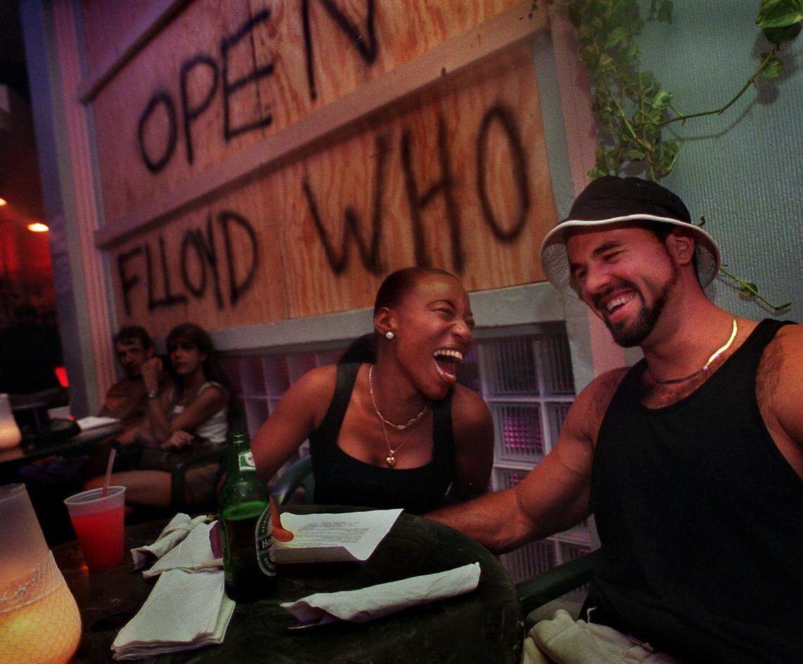 09/14/99 CANDACE BARBOT / AFTER HURRICANE FLOYD PARTYING: South Beach nightlife took no time to recover Tuesday following the passing of the threatening Hurricane Floyd, which passed off the coast of South Florida earlier in the afternoon. Here, HOPE GREEN (left) and her boyfriend CONRAD RITTER enjoy themselves at “The Clevelander” on Ocean Drive.