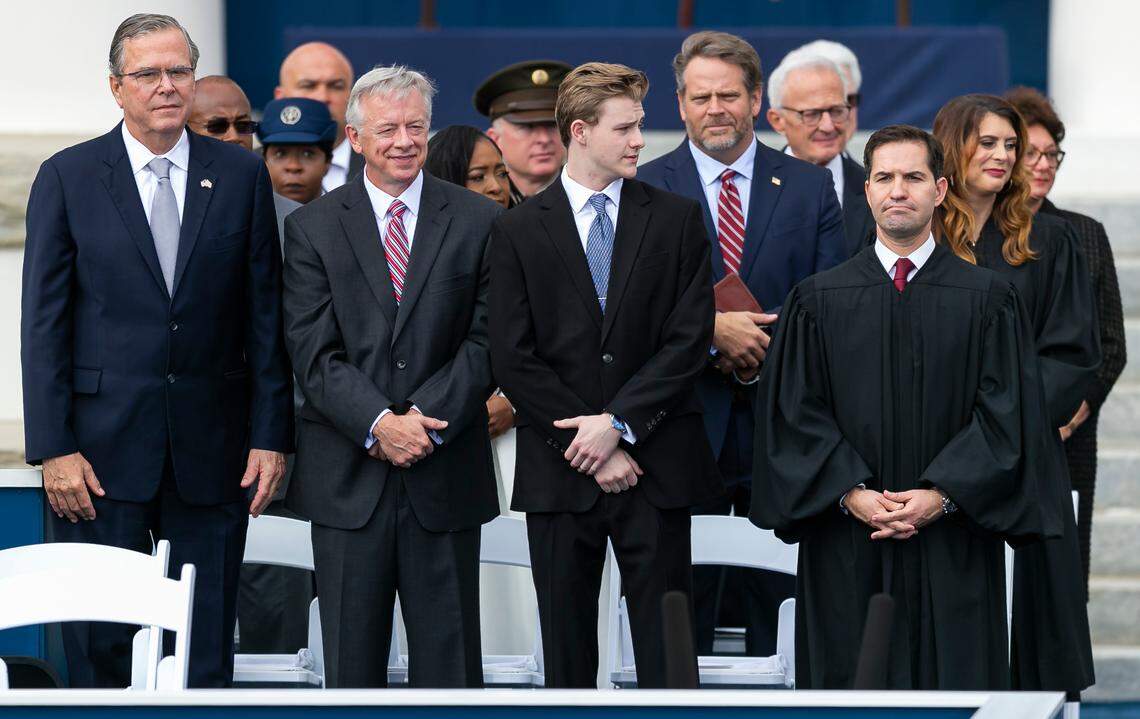 Former Florida Gov. Jeb Bush, at left, attends Gov. Ron DeSantis’ inauguration ceremony at the historic Florida Capitol on Tuesday, Jan. 3, 2023, in Tallahassee, Fla.
