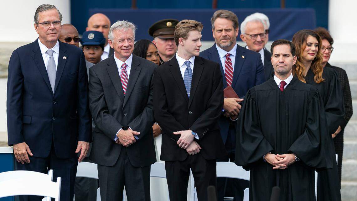 Former Florida Gov. Jeb Bush, left, attends Gov. Ron DeSantis’ inauguration ceremony at the Historic Florida Capitol on Tuesday, Jan. 3, 2023, in Tallahassee, Fla.