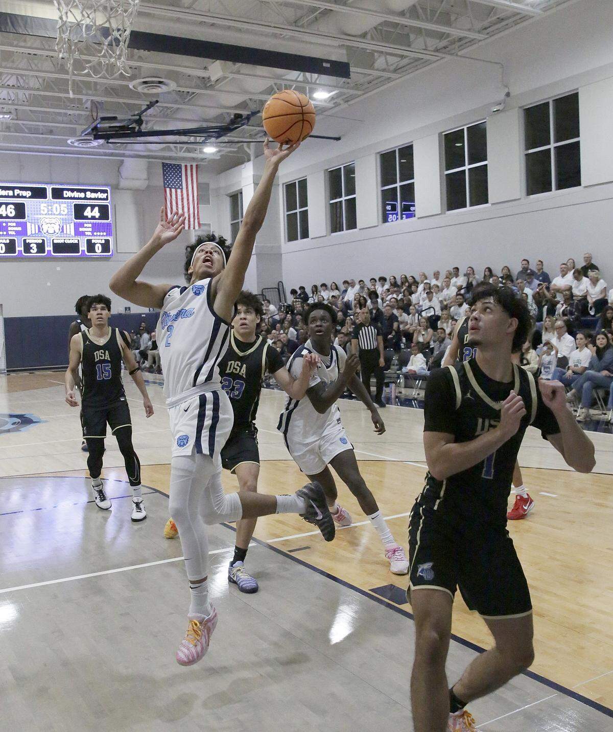 Riviera Prep Bulldogs Mason Fuentes (2) goes for a shot against Divine Savior Academy Sharks during the Region 4-2A semifinal boys basketball game on Thursday, February 19, 2026 at Riviera Prep School in Miami. Andrew Uloza / for Miami Herald