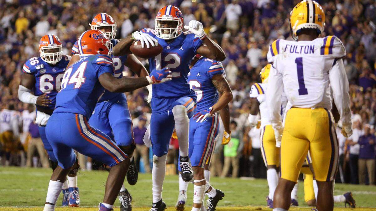 BATON ROUGE, LOUISIANA - OCTOBER 12: Van Jefferson #12 of the Florida Gators celebrates with teammates after scoring a touchdown against the LSU Tigers at Tiger Stadium on October 12, 2019 in Baton Rouge, Louisiana. (Photo by Marianna Massey/Getty Images)