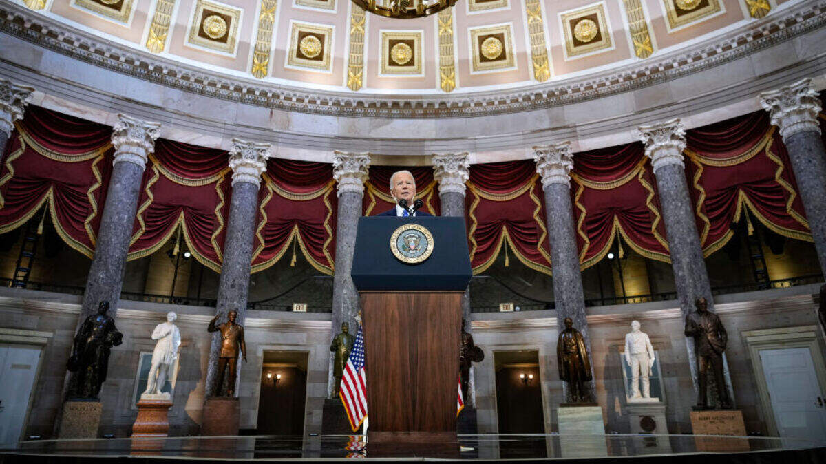 During a ceremony in Statuary Hall, President Biden speaks on the one-year anniversary of the Jan. 6 attack on the U.S. Capitol.