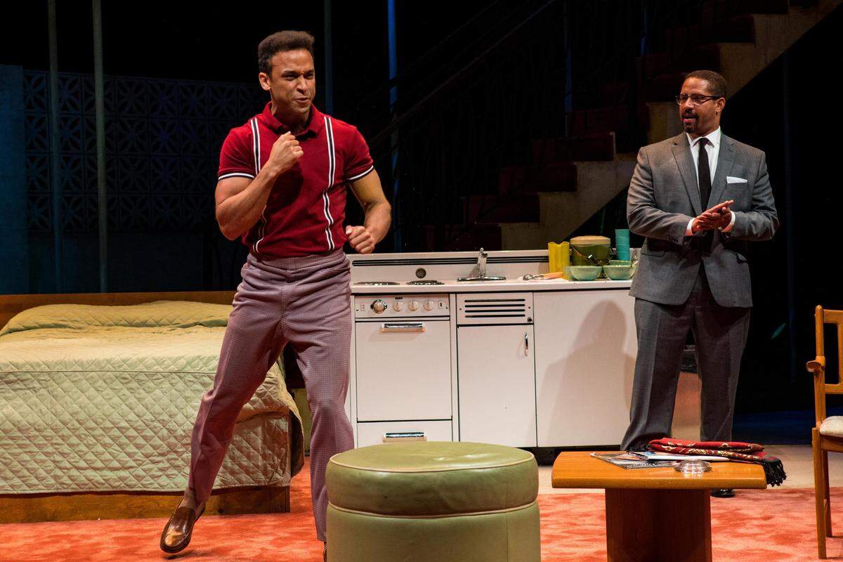 Kieron Anthony’s Cassius Clay tells Jason Delane’s Malcolm X about a great moment in his victory over Sonny Liston in Miami New Drama’s “One Night in Miami.”