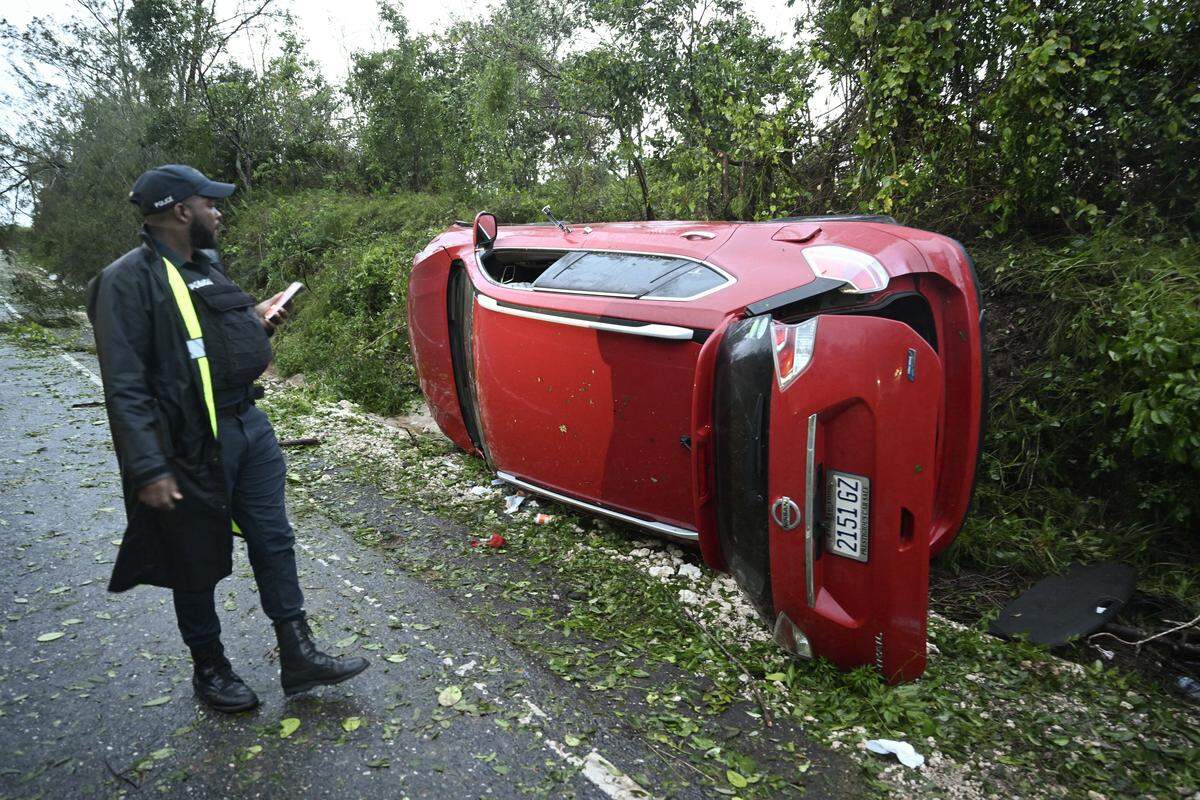 Hurricane Melissa ripped up trees and knocked out power after making landfall in Jamaica on October 29, 2025 as one of the most powerful hurricanes on record, inundating the island nation with rains that threaten flash floods and landslides.