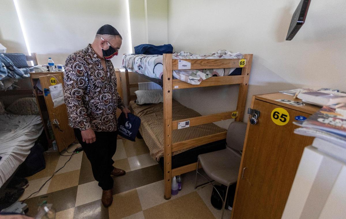 Heriberto Delvalle at his bunk at Camillus House on Wednesday, July 21, 2021. “The system is broken for people like him,” said Juan Carlos Gomez, director of Florida International University’s immigration law clinic.