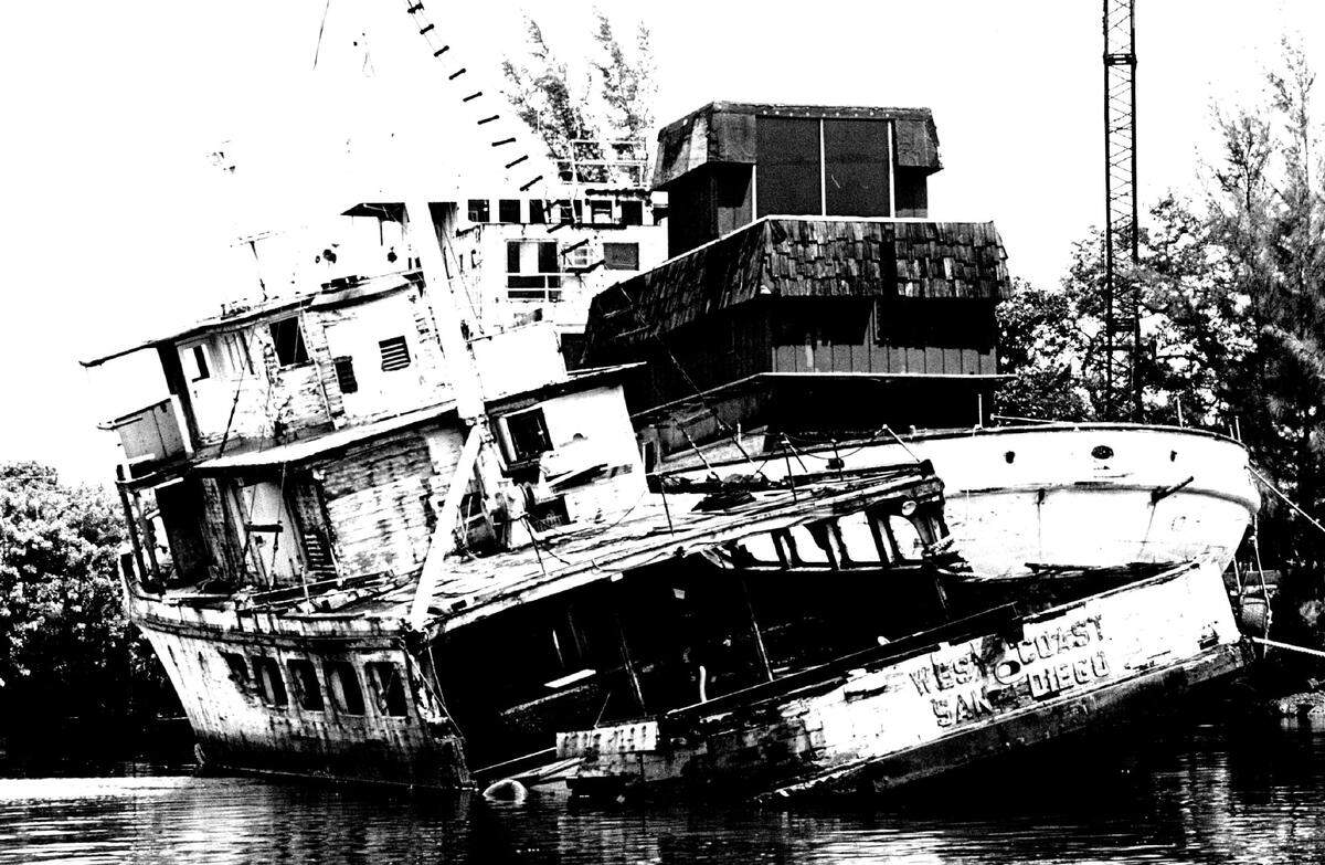 An abandoned boat on Miami River.