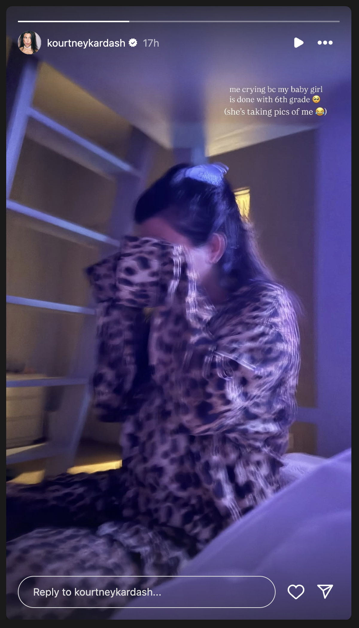 Kourtney Kardashian shares a photo of herself crying over her daughter.