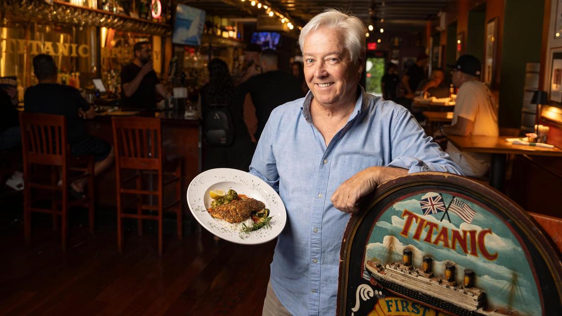 Kevin Rusk, owner of Titanic Brewery & Restaurant in Coral Gables, shows off the Mediterranean za’atar and lemon grilled salmon, one of the new dishes for the restaurant’s International Salmon Fridays promotion. Rusk created the special menu to lure diners during the slow season.