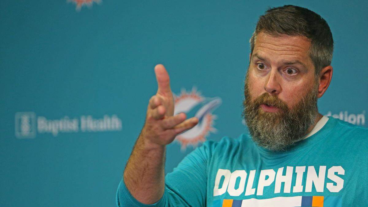 Miami Dolphins defensive coordinator Matt Burke talks to the media after the Miami Dolphins Organized Team Activities at the Baptist Health Training Facility in June.
