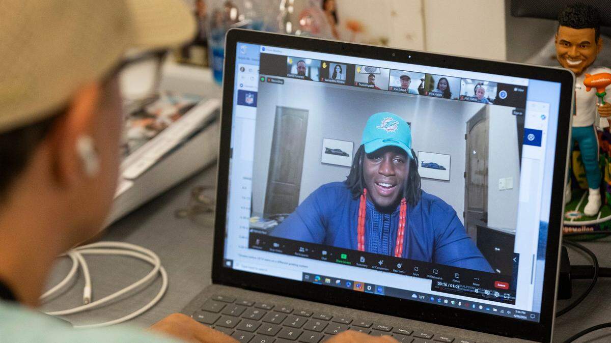 Reporters talk with Miami Dolphins offensive tackle Patrick Paul through a zoom meeting at the Baptist Health Training Complex on Friday, April 26, 2024 in Miami Gardens, Fla. Paul was the Miami Dolphins’ second-round 23rd pick during Friday’s NFL Draft.