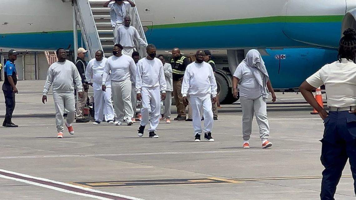 A group of Haitians arrive aboard an Immigration and Customs Enforcement flight in Haiti’s northern city of Cap-Haïtien in March after being deported by the Trump administration.