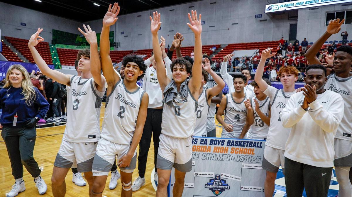 Riviera Prep celebrate on the court after defeating First Baptist in the Class 3A boy’s basketball state semifinal of the Florida High School State Championships at the RP Funding Center in Lakeland, Florida on Thursday, February 27, 2025.