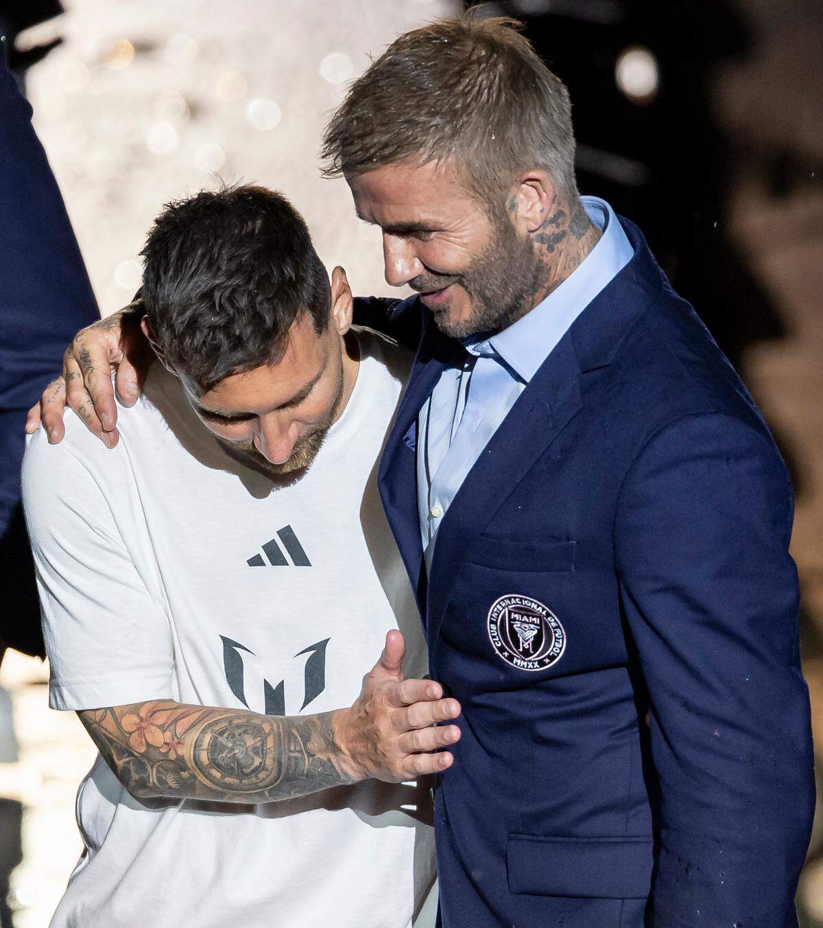Lionel Messi and David Beckham embrace during Inter Miami’s The Unveil event at DRV PNK Stadium on Sunday, July 16, 2023, in Fort Lauderdale, Fla. The event was held to officially welcome Argentine forward Lionel Messi (10) and Spanish midfielder Sergio Busquets (5) to the team.