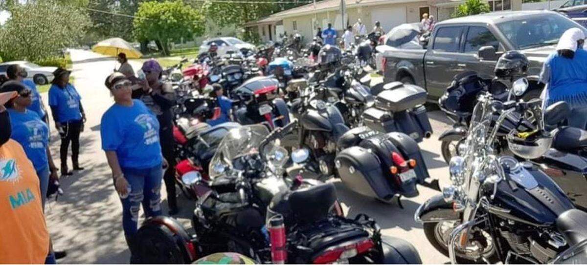 Riders gather outside Bessie Stringfield’s former home.