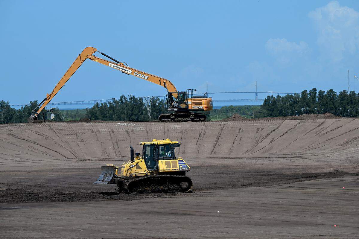 Site operators say they are making “amazing progress” at Piney Point, where the first pond is set to finally be closed by the end of July. More than 63 million gallons of contaminated water have also been drained into an underground injection control well.Workers in the Old Gypsum Stack South.