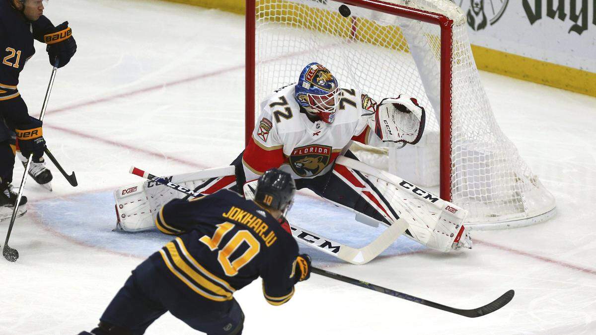 Buffalo Sabres defenseman Henri Jokiharju (10) puts the puck past Florida Panthers goalie Sergei Bobrovsky (72) during the first period of an NHL hockey game Saturday, Jan. 4, 2020, in Buffalo, N.Y. (AP Photo/Jeffrey T. Barnes)