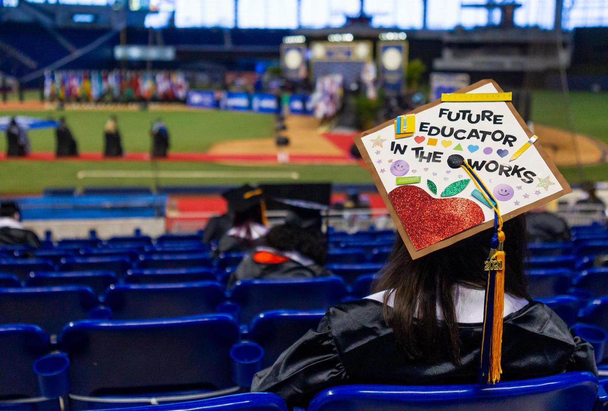 Miami Dade College students attend their graduation ceremony inside loanDepot park in Miami, Florida on Saturday, May 1, 2021.