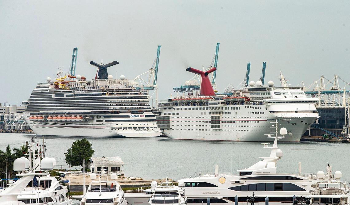 Cruise Ships Carnival Vista, left, and Carnival Sensation from Carnival Cruise Line, are seen docked at PortMiami after the CDC released a new phase of the Framework for Conditional Sailing Order for cruise ships operating or seeking to operate in U.S. waters, on Wednesday, April 21, 2021.