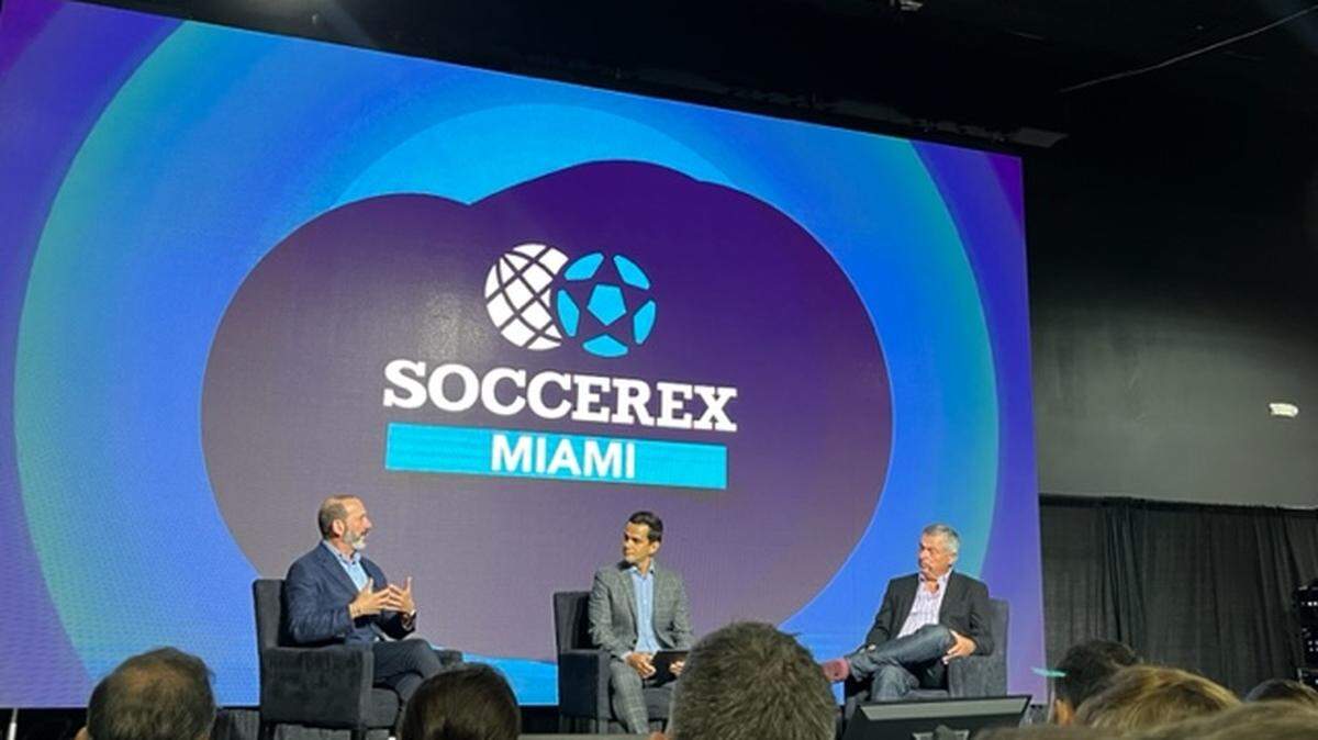MLS commissioner Don Garber (left) and Apple senior vice president of services Eddy Cue (right) discuss Lionel Messi’s effect on the league, and other topics, at Soccerex conference in Miami Nov. 14, 2023.