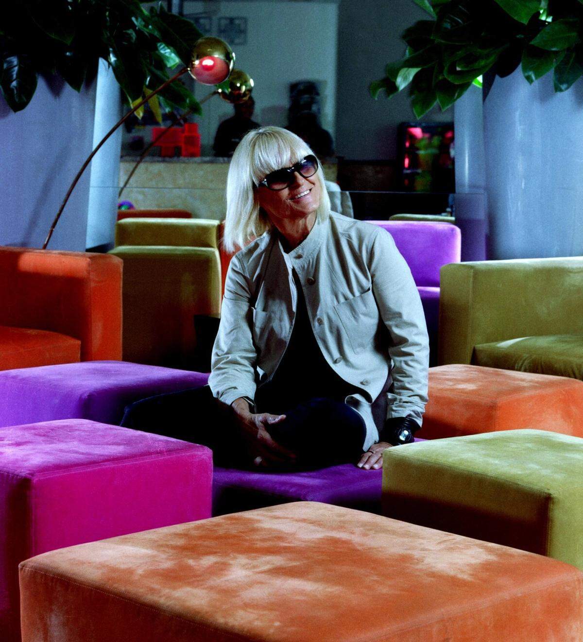 Fashion icon Barbara Hulanicki sits amid the multi-color seats she designed for the lobby of South Beach’s Kent Hotel in a 2001 photo.