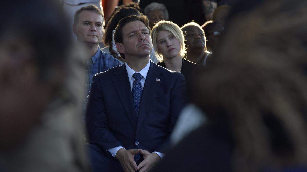File photo of Jacksonville Mayor Donna Deegan, Florida Gov. Ron DeSantis, Jacksonville Sheriff T.K. Waters and council member Ju’Coby Pittman at an Aug. 27 prayer vigil after the shooting at a Dollar General store in Jacksonville.