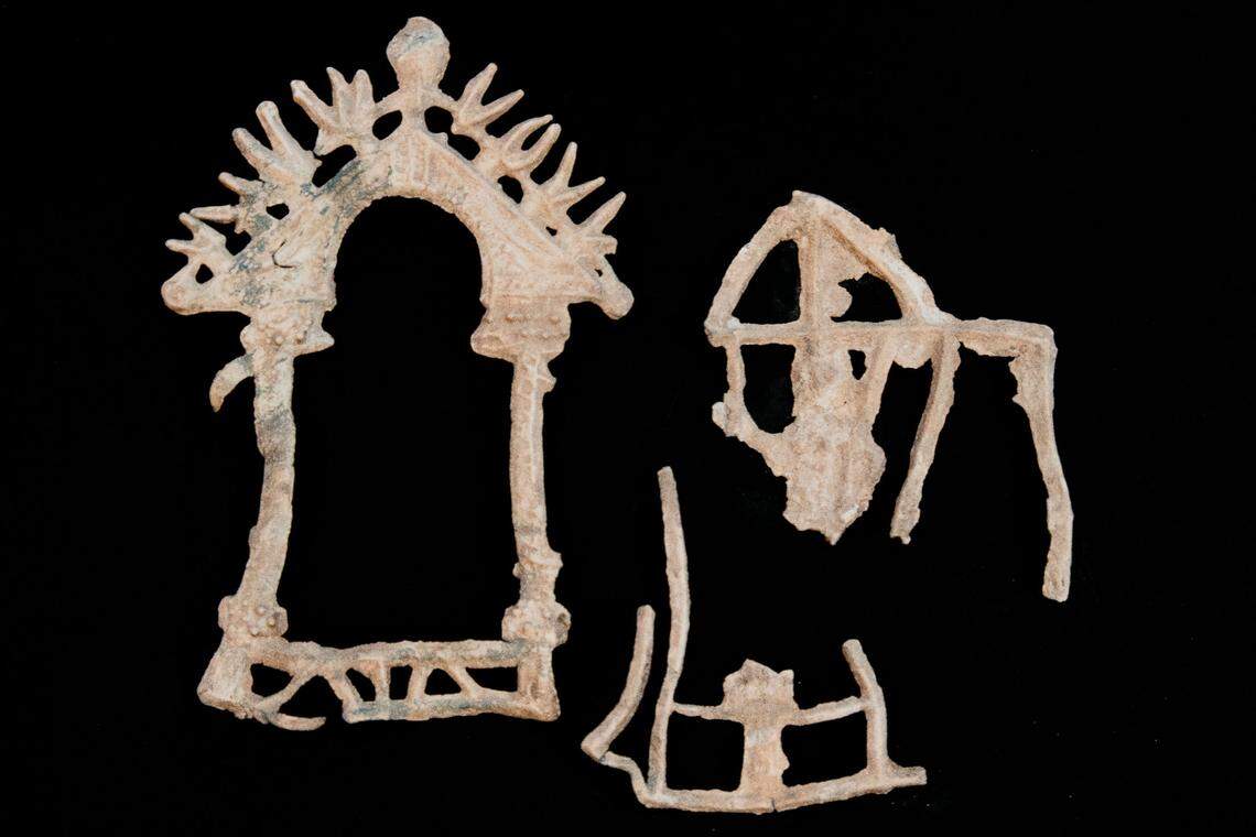 A lead figurine excavated from a border ditch at the cemetery.