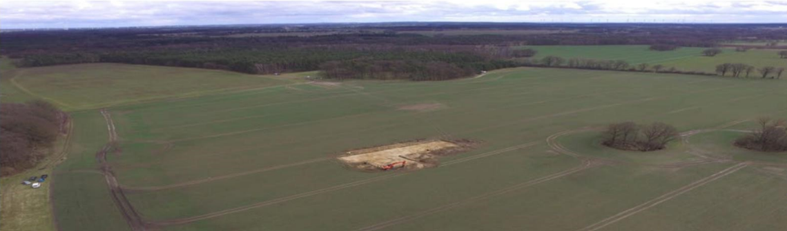 An aerial view of the meeting hall and its surroundings.